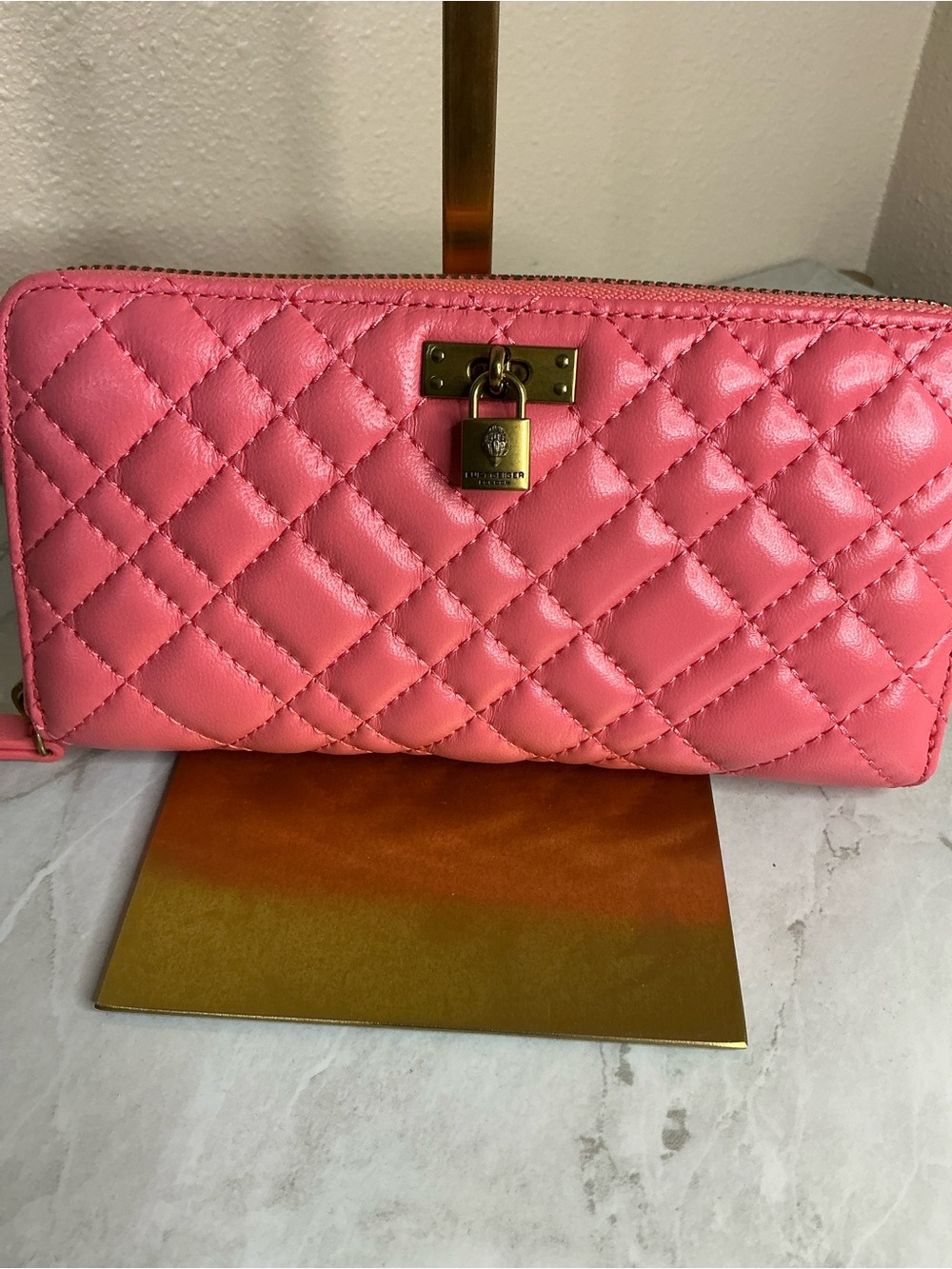 Kurt Geiger London Brixton Zip Wallet in quilted pink leather W/ Gold Padlock.